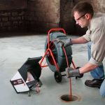 Sewer being inspected with a camera