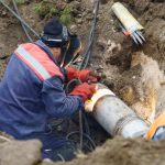 Main drain pipe being repaired