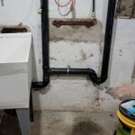 drain pipe attached to basement sink